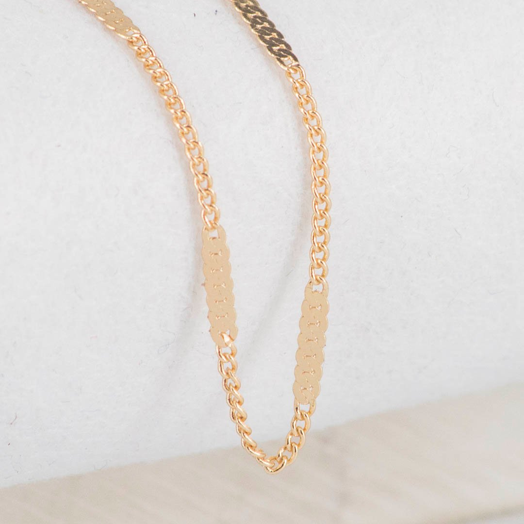 46217 - CADENA CUBANA DESTELLO ALARGADO 2MM-45CM CADENA CUBANA DESTELLO ALARGADO 2MM-45CM