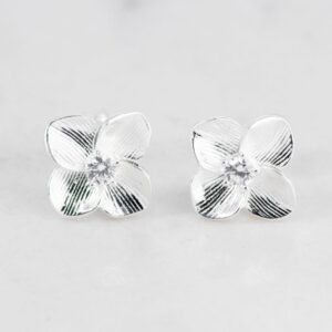 P34167-TOPO-TREBOL-TALLADO-CIRCON-EN-EL-MEDIO-1.jpg TOPO TREBOL TALLADO CIRCON EN EL MEDIO